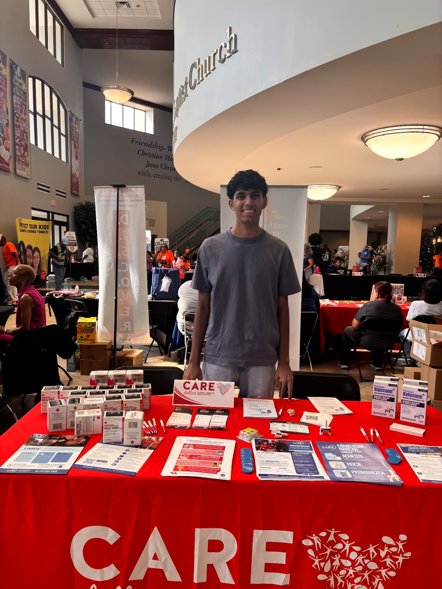United Against Use volunteer at the CARE Dallas outreach table